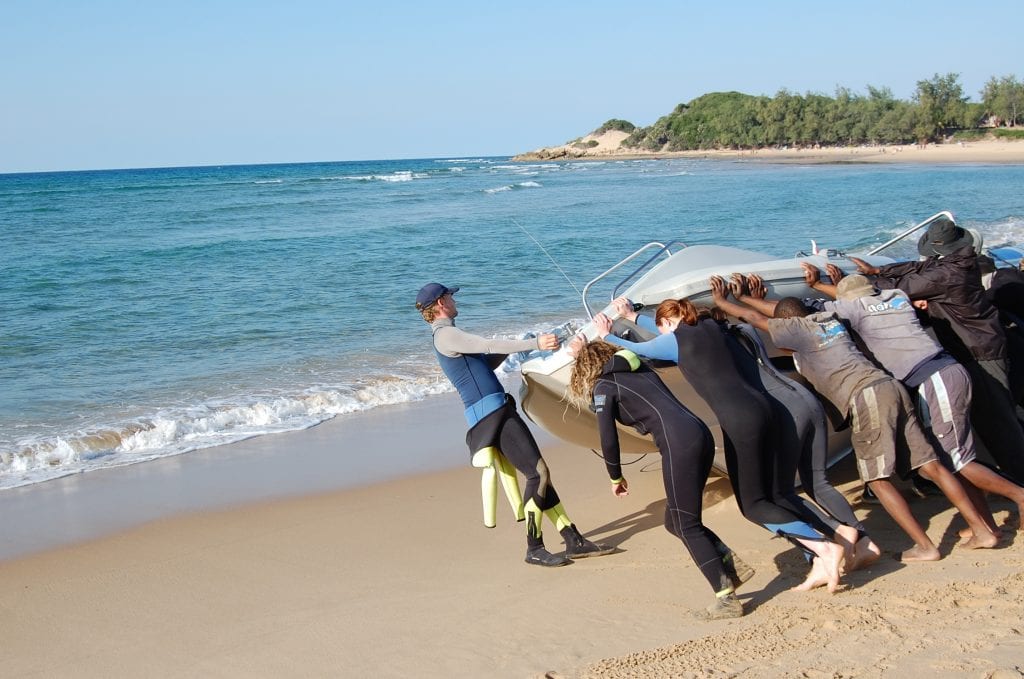 Getting the dive boat into the water, Tofo, Mozambique