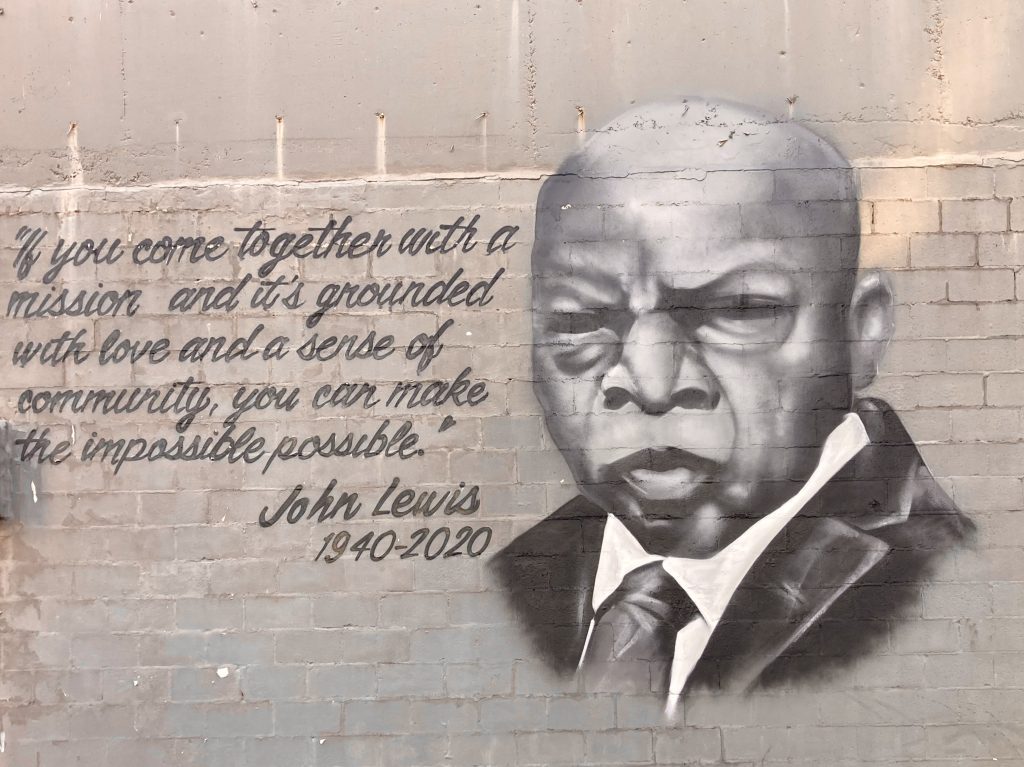 John Lewis's words on a wall in downtown Birmingham: "If you come together with a mission and it's grounded with love and a sense of community, you can make the impossible possible."