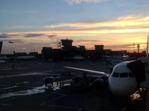 View of aircraft at Atlanta airport during sunrise