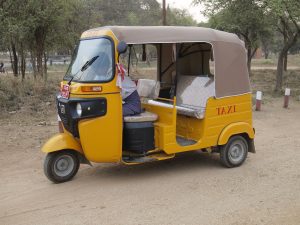Yellow tuk-tuk taxi